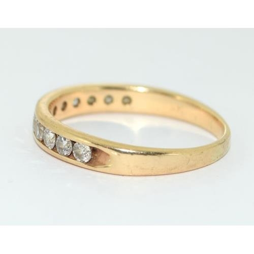 255 - 18ct gold ladies Diamond 1/2 eternity ring of approx 0.75ct size Y