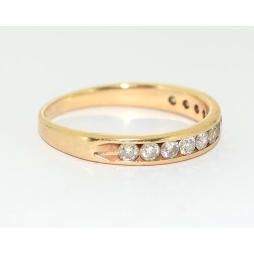 255 - 18ct gold ladies Diamond 1/2 eternity ring of approx 0.75ct size Y