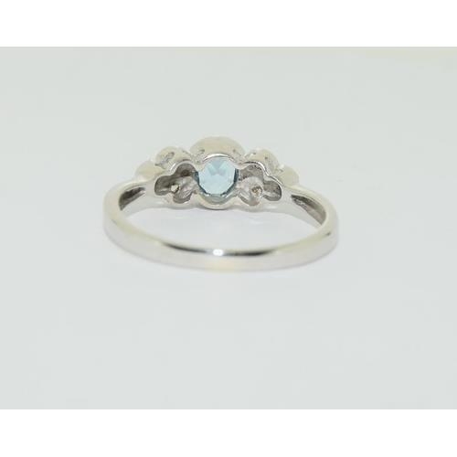 191 - 9ct white gold aquamarine diamond ring, size L