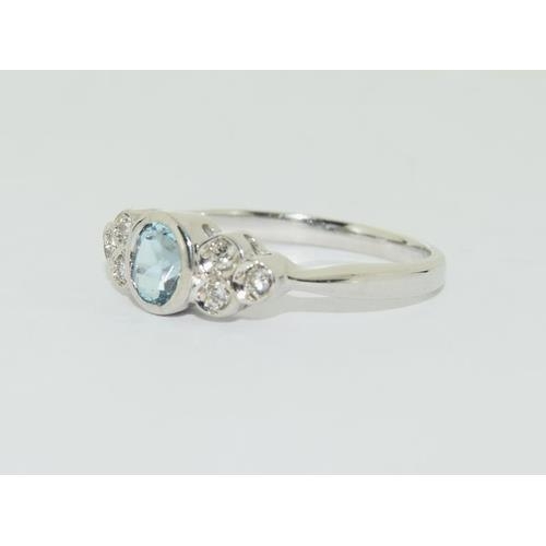 191 - 9ct white gold aquamarine diamond ring, size L