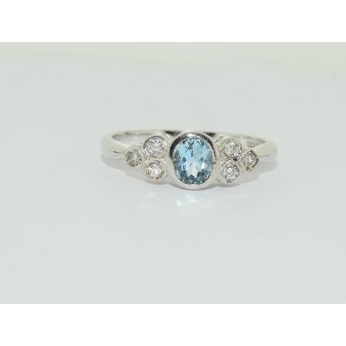 191 - 9ct white gold aquamarine diamond ring, size L