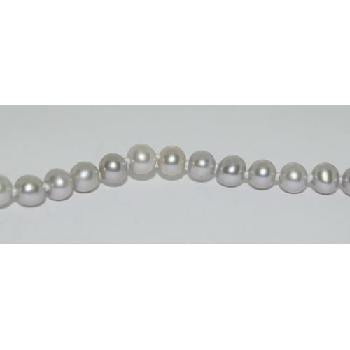 246 - Cultured pearl silver clasp bracelet.