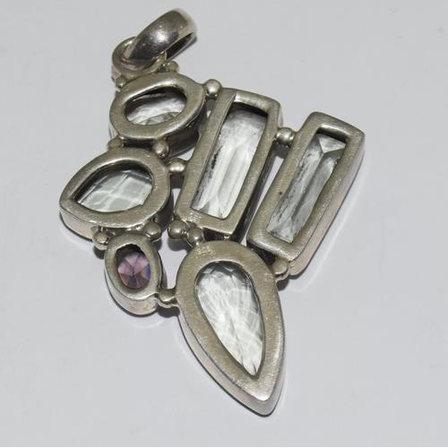 247 - A silver green amethyst pendant.