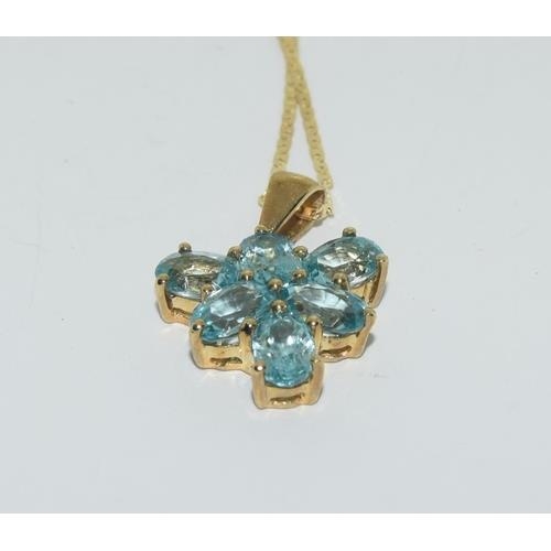 272 - 9ct Gold blue Zircon necklace.