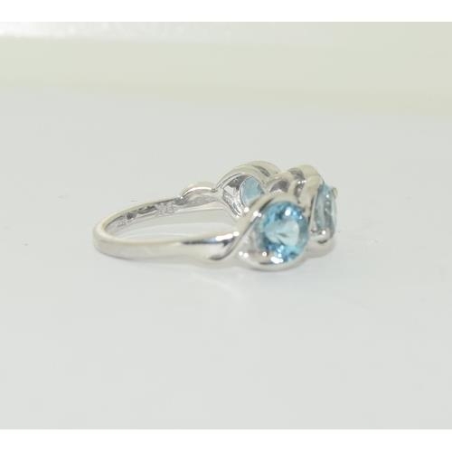 251 - 9ct Gold aquamarine four stone ring, Size N