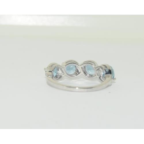 251 - 9ct Gold aquamarine four stone ring, Size N