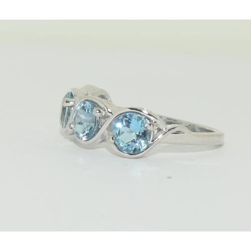 251 - 9ct Gold aquamarine four stone ring, Size N