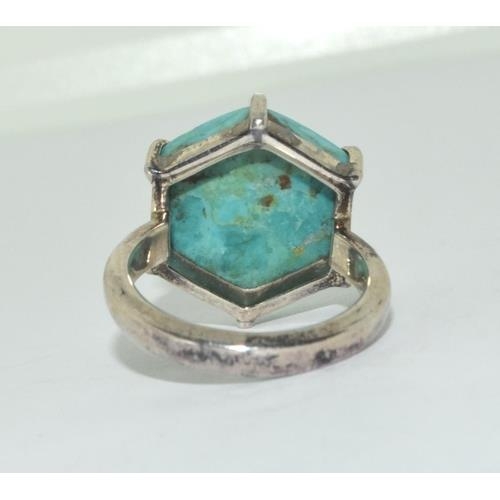 229 - A silver turquoise ring Size O.