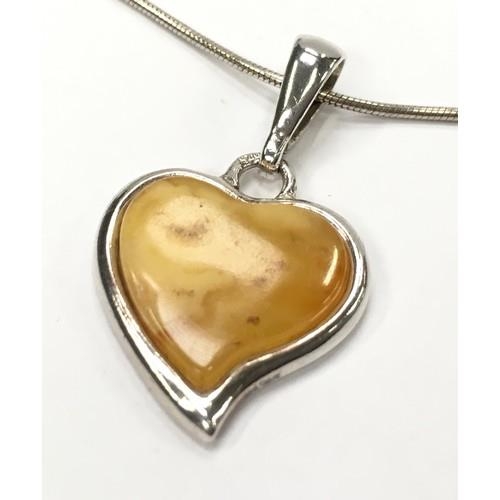 316 - Baltic egg yolk amber 925 silver heart pendant.