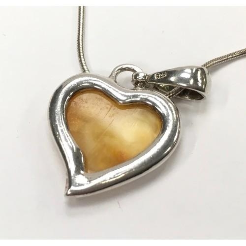 316 - Baltic egg yolk amber 925 silver heart pendant.