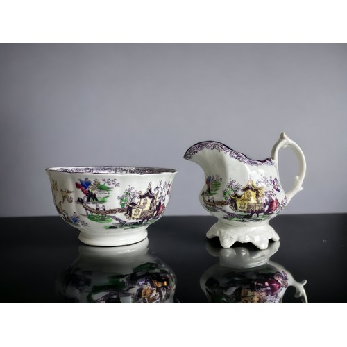 157 - A 19TH-CENTURY PART TEA SET, DECORATED IN 'CHINOISERIE' PATTERN.
38 PIECES.