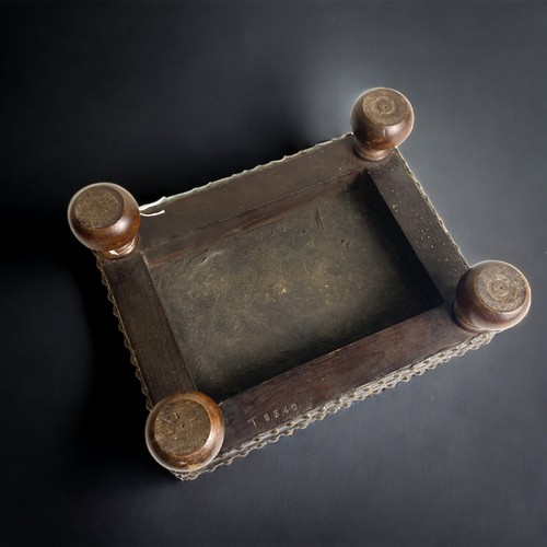 2 - A 19TH CENTURY LEATHER FOOT STOOL , WITH BRASS STUDS AND BALL FEET.