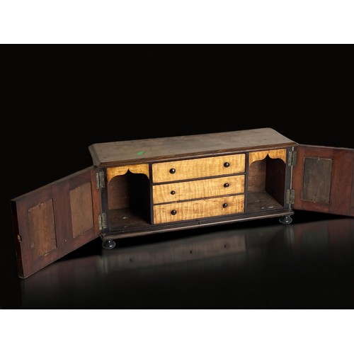 3 - A VICTORIAN TABLE TOP CABINET. WITH FITTED INTERIOR AND MIRROR FRONTS TO TWIN LOCKING DOORS. 
51 X 2... 