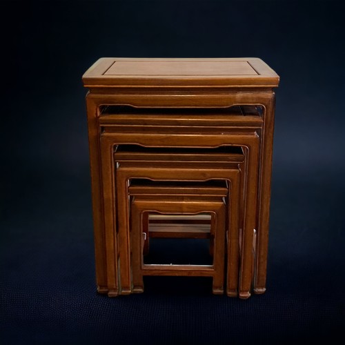 16 - A FOUR PIECE GRADUATING CHINESE ROSEWOOD NEST OF TABLES.