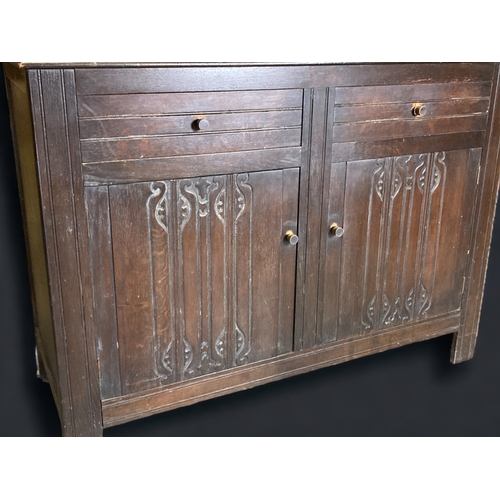 46 - AN ENGLISH CARVED OAK COURT CUPBOARD.