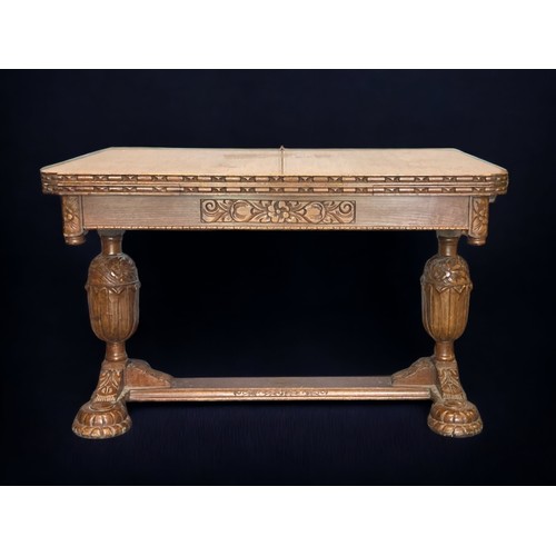 58 - A VICTORIAN CARVED OAK EXTENDING DINING TABLE.