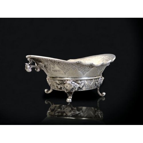 91 - A VICTORIAN STERLING SILVER BON BON DISH.
LONDON HALLMARKS FOR 1879.
STYLISED SCROLLING FOLIATE DESI... 