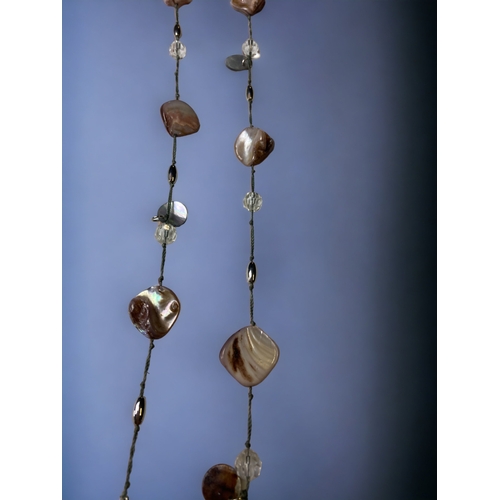 105A - A COLLECTION Of COSTUME JEWELLERY NECKLACES INCLUDING ABALONE SHELL.