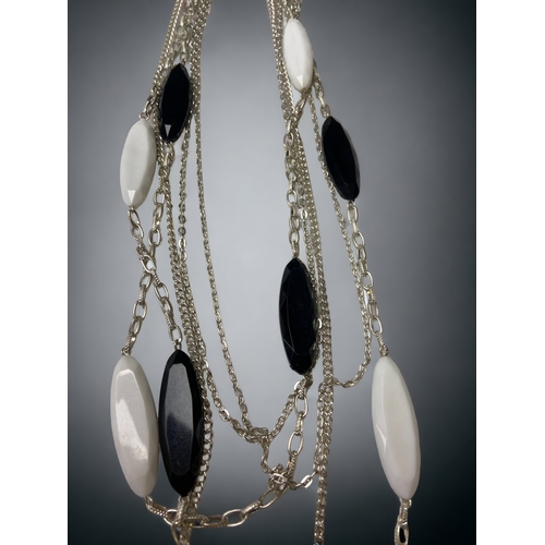 105A - A COLLECTION Of COSTUME JEWELLERY NECKLACES INCLUDING ABALONE SHELL.