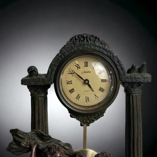 168A - A JULIANA COMPOSITE MANTLE CLOCK.