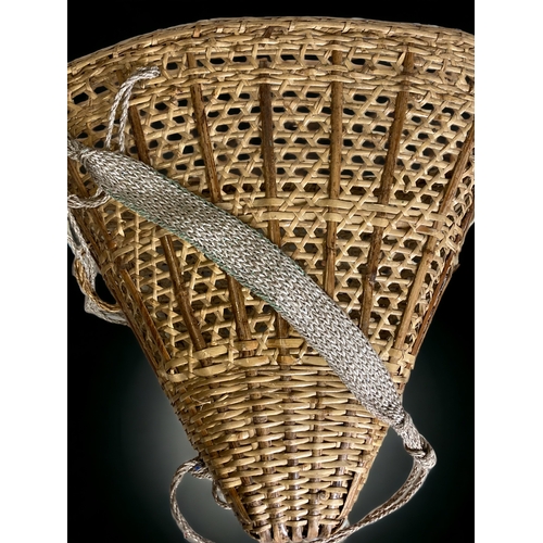 216 - A VINTAGE CHINESE WICKER TEA LEAF CARRY BASKET. WITH SHOULDER STRAP. 
48 X 54CM