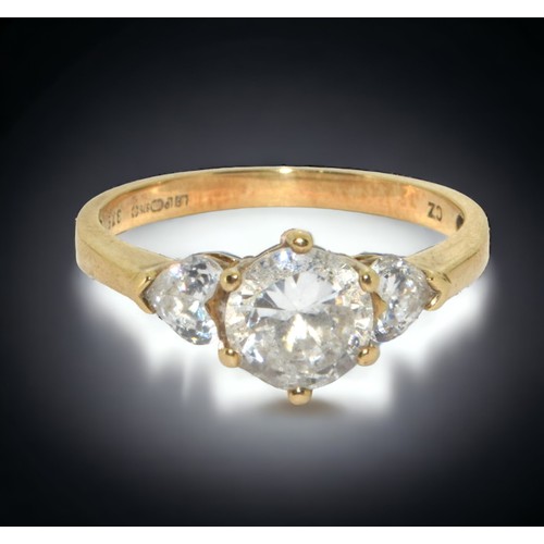 119 - A 9ct Gold and Cubic Zirconia Ring. Round cut central set accented by two heart shape stones.
Size N