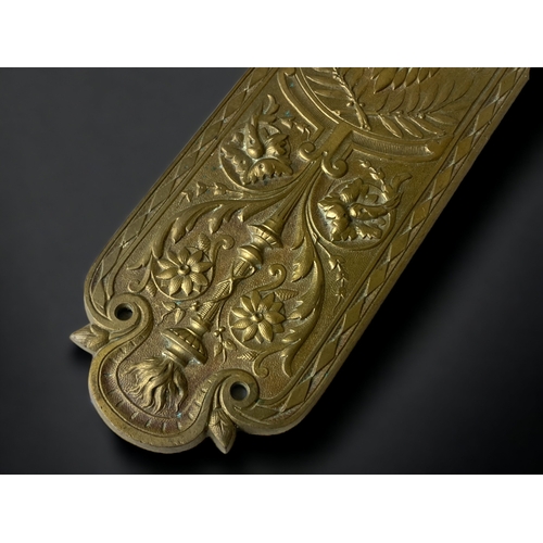 59 - 19TH CENTURY GILT BRONZE DOOR FINGER PLATE. FOUNDRY MARKS TO BASE. 
31CM LONG.