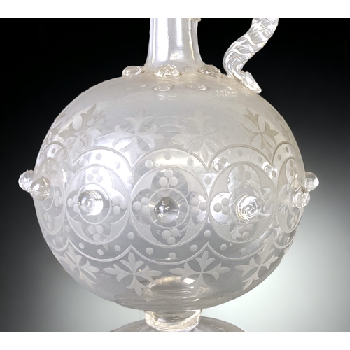 68 - A 19TH CENTURY GLASS DECANTER. ENGRAVED STYLISED & KNOBBED DESIGN. 
24CM TALL.