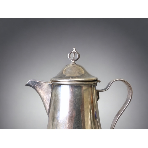 76 - AN ART NOUVEAU WMF SILVER PLATE LIDDED JUG. 
22CM TALL.