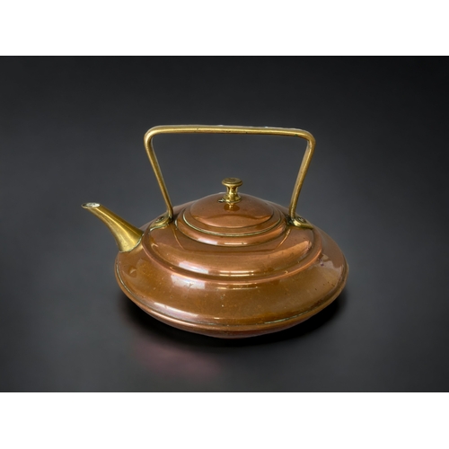 77 - A VICTORIAN DR CHRISTOPHER DRESS COPPER & BRASS TEAPOT. 
BY BENHAM & FROUD.
15 X 22CM