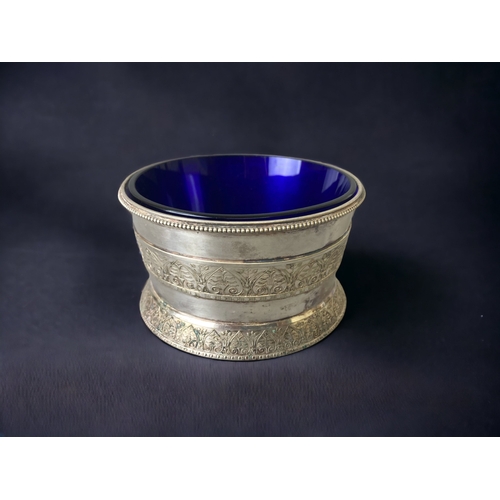 79 - AN ELKINGTON SILVER PLATE GLASS LINED BOWL. ATTRIBUTED TO DR CHRISTOPHER DRESSER. 
6 X 10.5CM