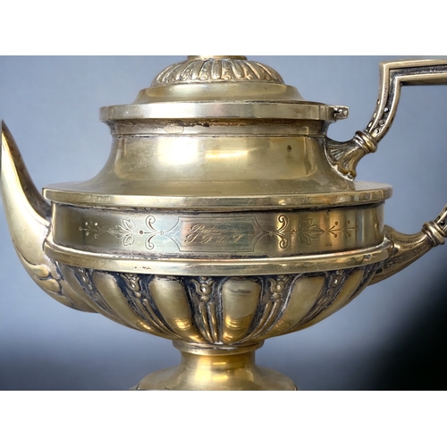 82 - A WMF SILVER PLATE TEAPOT.
ENGRAVED & DATED 1893. 
WMF HOLLOW WARE MARKS TO BASE. 
19 X 25CM