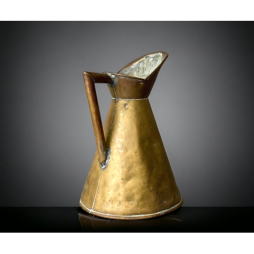 86 - A CHRISTOPHER DRESSER COPPER JUG, BY H. LOVERIDGE, C1890.
22CM TALL