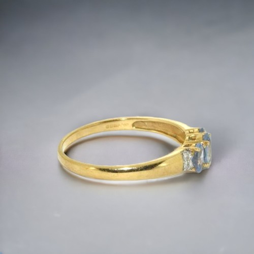 153 - A 9ct gold ladies Diamond and Tanzanite ring.
Size W.