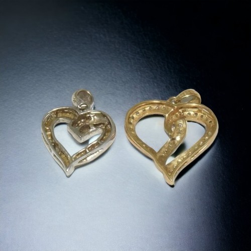 142 - Two Diamond, 9ct gold Heart pendants. 3.5g