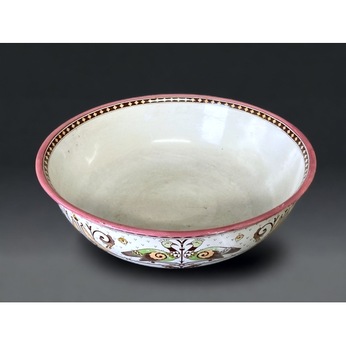 97 - ATTRIBUTED TO CHRISTOPHER DRESSER, A LARGE VICTORIAN BROWNFIELD WASH BOWL.
13 X 38CM.