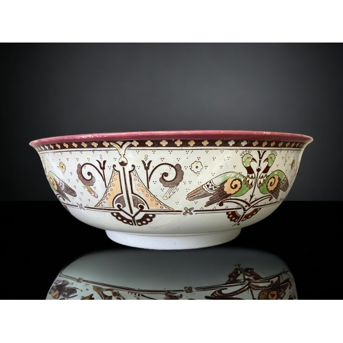 97 - ATTRIBUTED TO CHRISTOPHER DRESSER, A LARGE VICTORIAN BROWNFIELD WASH BOWL.
13 X 38CM.