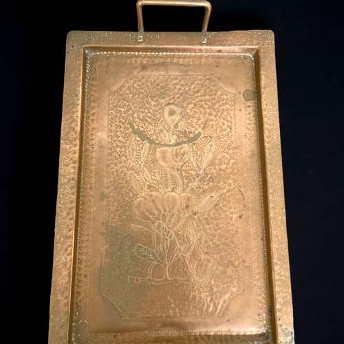 175 - AN ARTS & CRAFTS COPPER TRAY. POSSIBLY JOSEPH SANKEY? STAMPED 'JS'.
44 X 27.5 CM