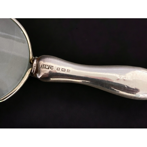 123 - A STERLING SILVER MAGNIFYING GLASS. 
BY HENRY WILLIAMSON LTD, BIRMINGHAM HALLMARKS.
11.5CM LONG.