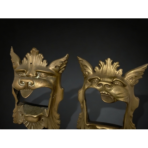 176 - A LARGE PAIR OF VICTORIAN GOTHIC CAST BRASS DOOR MASKS. 
36CM TALL.