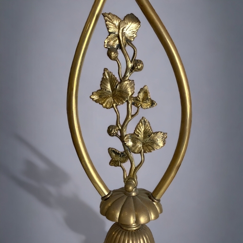 101 - A BRASS ART NOUVEAU TWIN BRANCH LAMP.
ON BLACK GLASS BASE.
 54CM TALL.