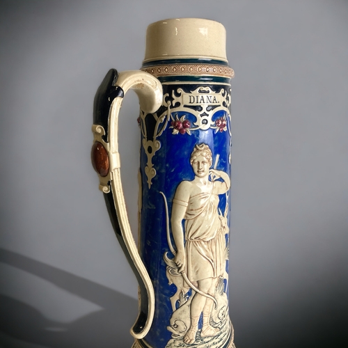 211 - A VERY LARGE 19TH CENTURY REINHOLD HANKE DECORATIVE BEER STEIN. DEPICTING DIANA, MARS & MINERVA. 
58... 