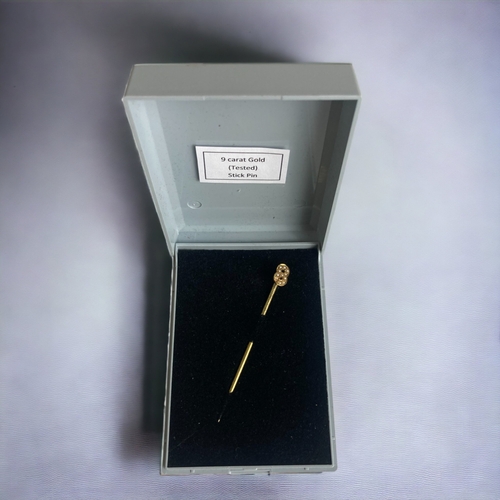 133 - A VICTORIAN 9CT GOLD & SEED PEARL STICK PIN. 
UNMARKED, TESTS AS 9CT.
65MM LONG.