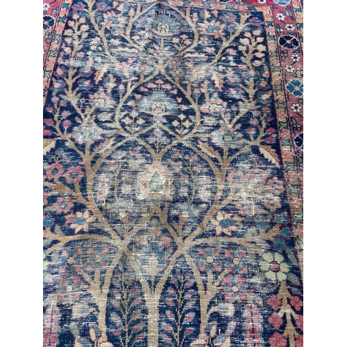 18 - A 19TH CENTURY RUG.