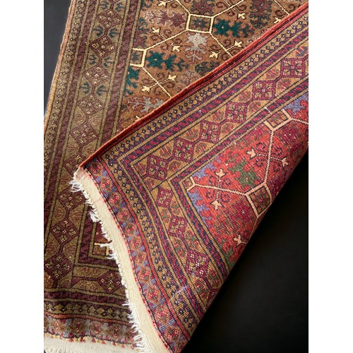 19 - AN ANTIQUE 19TH / 20TH CENTURY RUG.