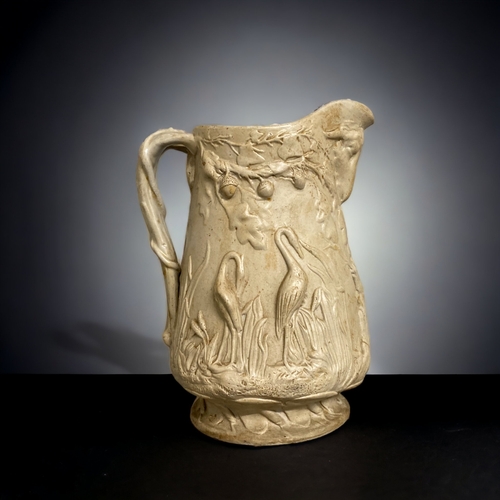 221 - A 19TH CENTURY RIDGWAY RELIEF DECORATED JUG. TOGTHER WITH A MAJOLICA CORN HARVEST JUG, WITH PEWTER L... 