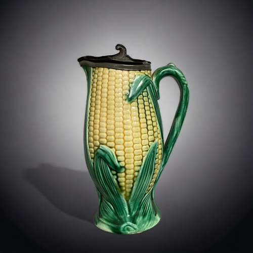 221 - A 19TH CENTURY RIDGWAY RELIEF DECORATED JUG. TOGTHER WITH A MAJOLICA CORN HARVEST JUG, WITH PEWTER L... 