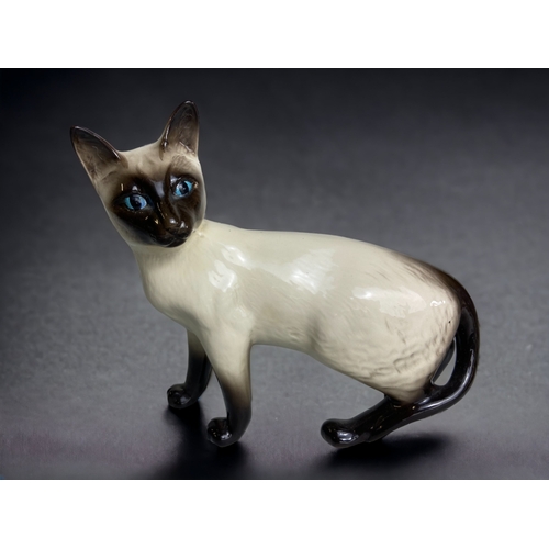 223 - A GROUP OF PORCELAIN FIGURES INCLuding 2 PORCELAIN CATS (DOULTON AND BESWICK), LLADRO AND COALPORT F... 