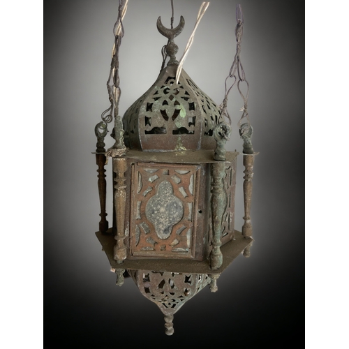 232 - ANTIQUE PERSIAN HANGING LANTERN, WITH COLOURED GLASS PANELS.