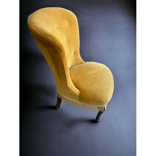 20 - A QUEEN ANNE STYLE LOW BACK NURSING CHAIR. YELLOW VELVET UPHOLSTERED AND CABRIOLE LEGS.